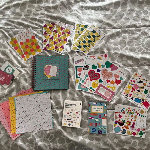 Scrapbooking kit used with stickers and decorative papers