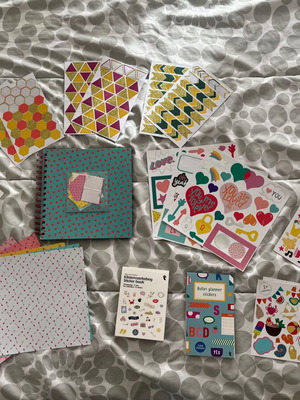 Scrapbooking kit used with stickers and decorative papers