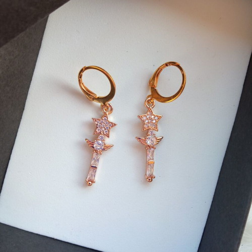 Magical girl star earrings gold color huggies with brass charms