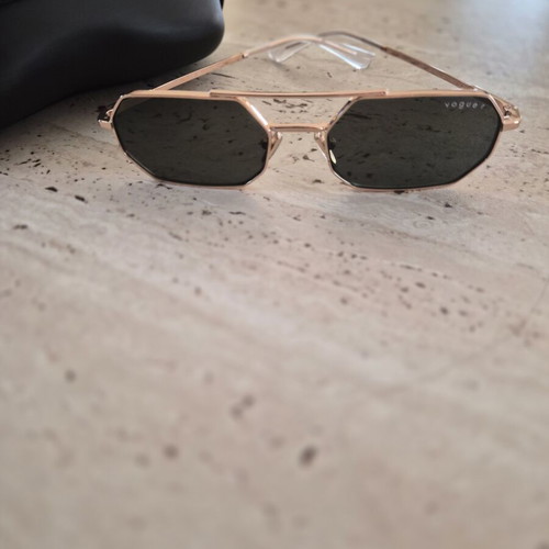 Vogue sunglasses new, gold metal frame with dark lenses