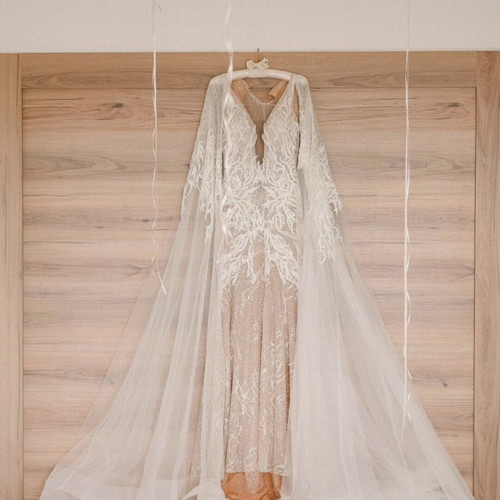 Two wedding dresses like new, one Millanova, size small-medium