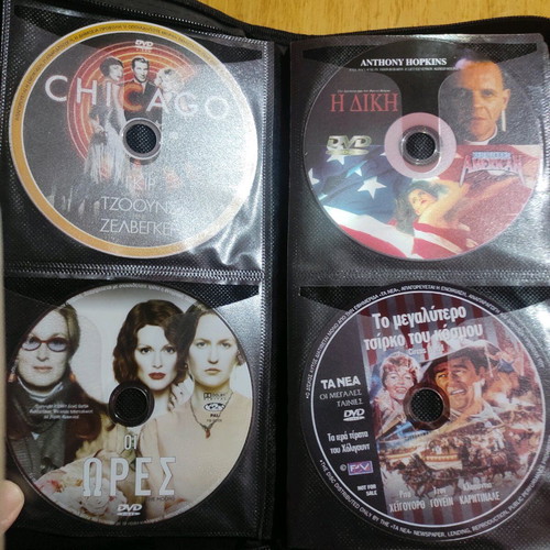 DVD set of 56 with foreign movies like new, in case with sleeves