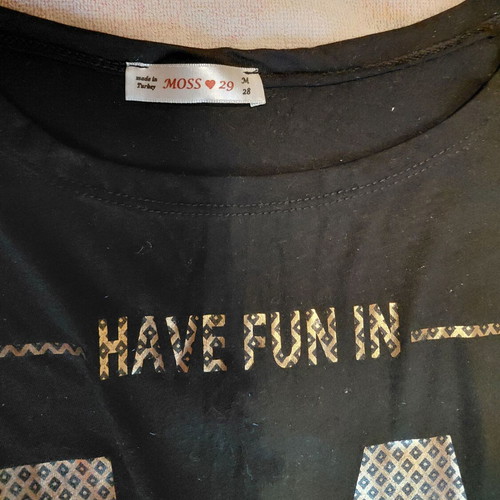 Black top with gold print like new, size M