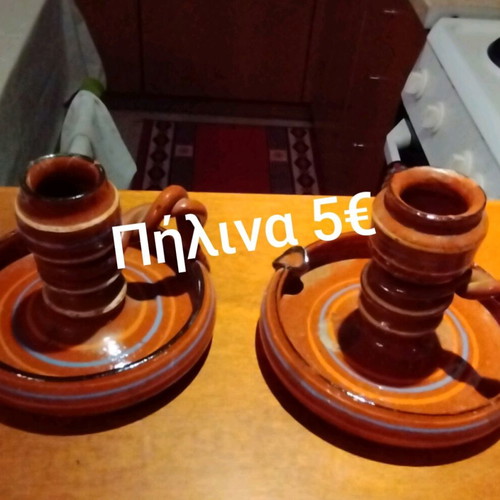 Clay candlesticks like new