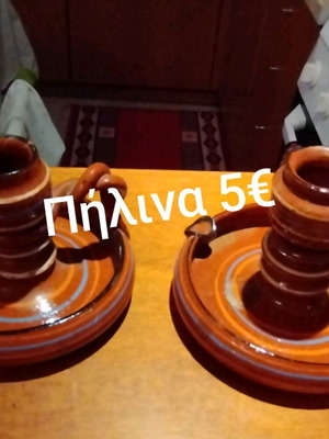 Clay candlesticks like new