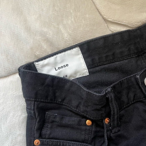 H&M loose fit black jeans like new W30/32