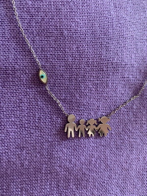 Family necklace made of steel like new with silver eye charm