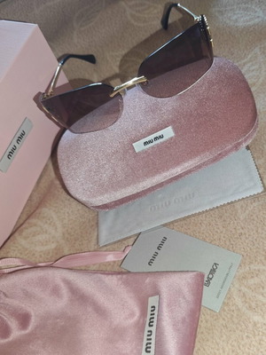 Miu Miu sunglasses used with original box