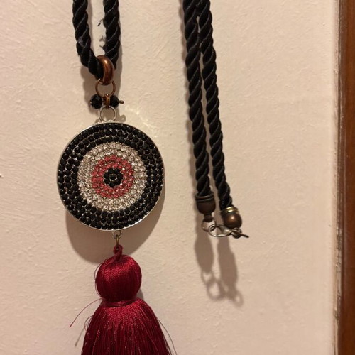 Long necklace with eye and tassel used, silver black and burgundy rhinestones