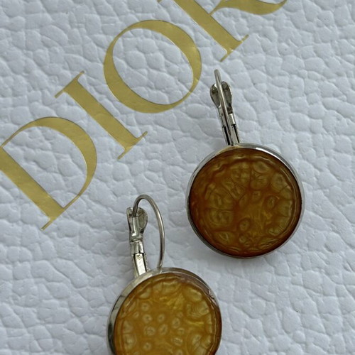 Handmade dangling earrings with warm gold-orange interior, like new
