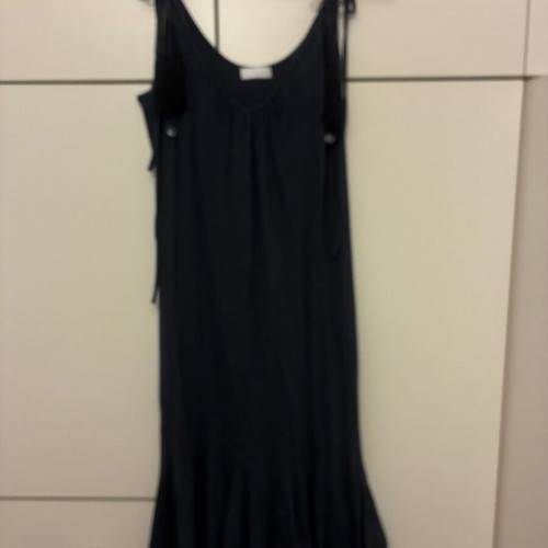Holly dress new with unique hem and beads on straps