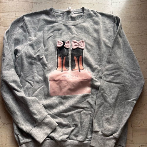 Women's gray sweatshirt like new, size large with shoe print