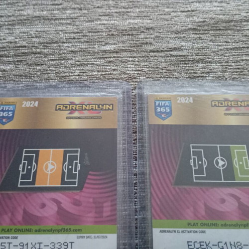 Panini FIFA 365 2024 Momentum X-Rare cards set with Mbappé & Rodri
