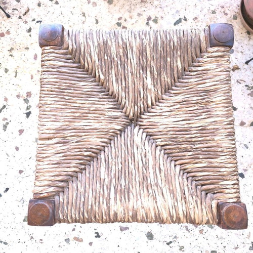 Vintage wicker stool used with wooden frame