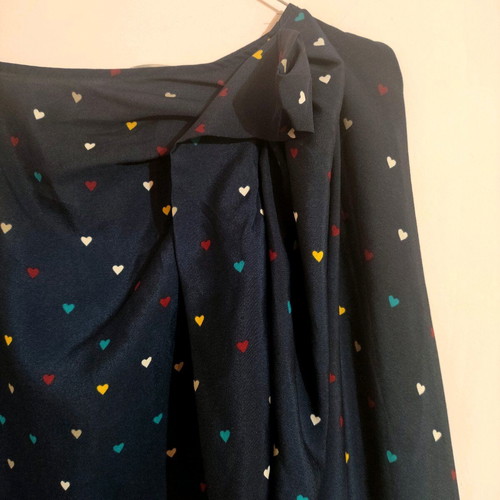 Office pants and top with hearts used, yellow and blue