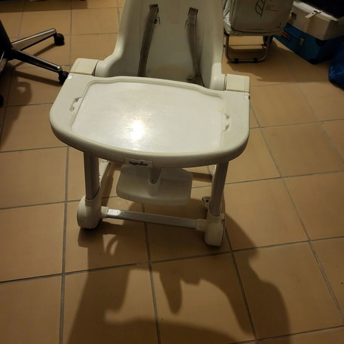 Inglesina high chair used with height adjustments and foldable storage