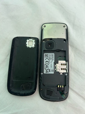 Nokia 2220s used phone without battery needs new panel