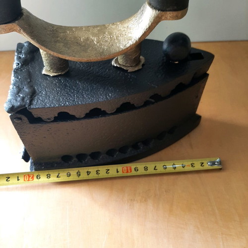 Charcoal iron used from 1920-30 with thorough restoration