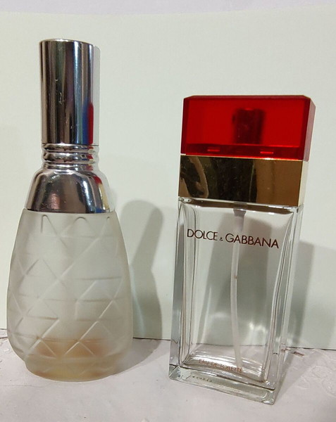 2 μπουκάλια  κολώνιας DOLCE CABBANA & ESTEE LAUDER-estee, άδεια