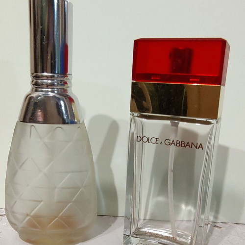 Dolce Gabbana and Estee Lauder colognes used, 2 empty bottles