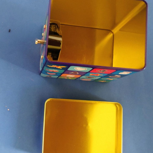 Christmas music box with winding key and festive designs