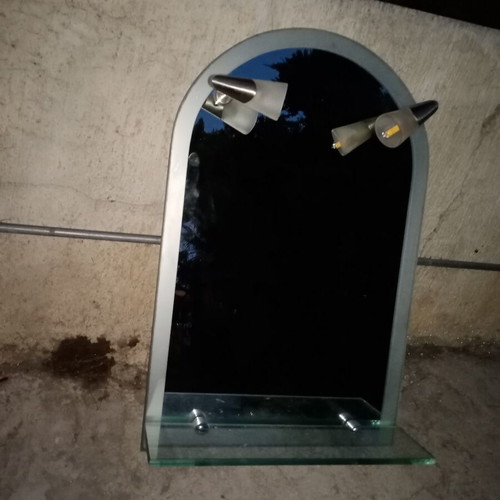 Semi-circular bathroom mirror used with 2 lights and shelf