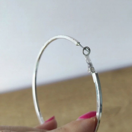 Large hoop earrings set 2 pairs like new, silver and black hammered