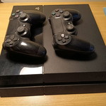 PlayStation 4 (PS4) like new with 2 controllers and HDMI cables