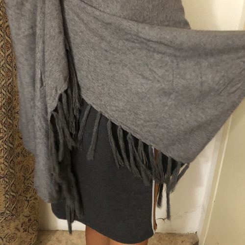 Gray poncho used with fringes