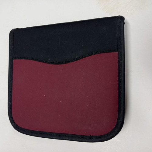 CD case small used, black and burgundy, 12 slots