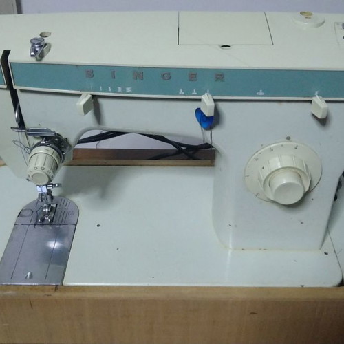 Singer 258 sewing machine like new with cabinet and table stand