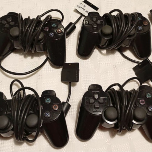 Sony PlayStation 2 Slim like new with cables and controllers