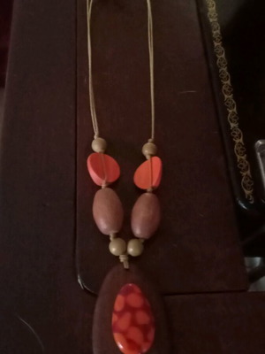 Wooden necklace like new, brown and orange