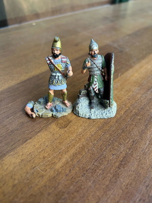 Soldier figures, one with detached arm
