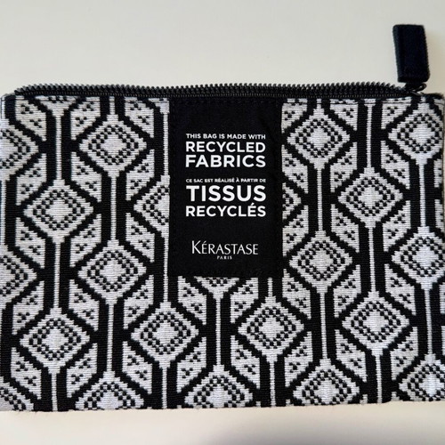 Kerastase fabric toiletry bag like new with geometric patterns in black and white