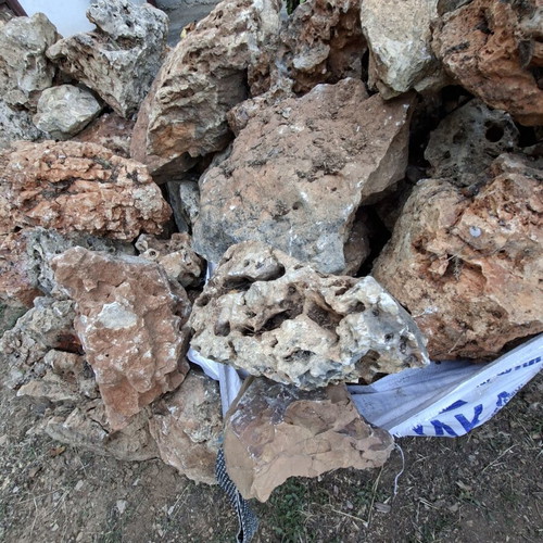 Decorative stones with holes used for waterfalls and rock gardens