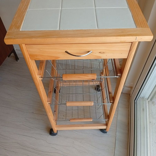 Classic wooden kitchen trolley with ceramic tile top