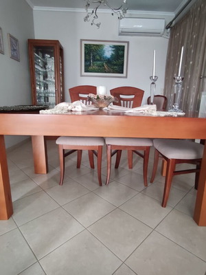 Living room furniture like new solid wood table, buffet and glass cabinet