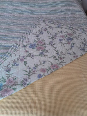 Double-sided quilt used in excellent condition