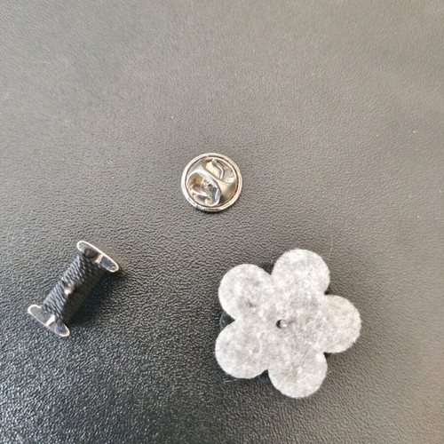 Set of two men's lapel pins like new, black and silver