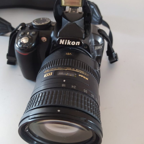 Nikon D3100 DSLR camera used with AF-S DX Nikkor 18-200mm f/3.5-5.6G ED VR lens