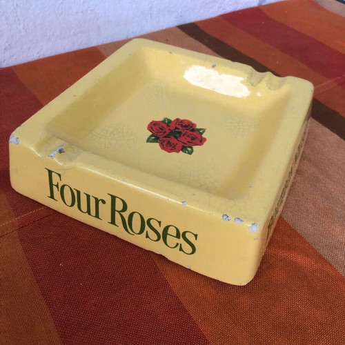 Four Roses porcelain ashtray used with cracks and chips