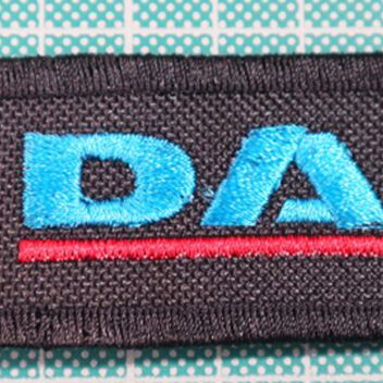 Fabric keychain Truck with embroidered logo 12x3 cm new, black