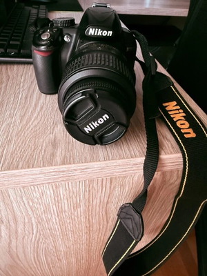 Nikon D3100 used with AF-S DX Nikkor 18-55mm VR lens and accessories
