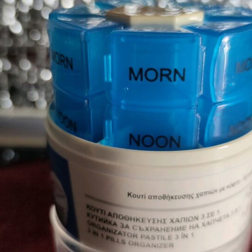 Rotating plastic weekly pill organizer new medication storage device