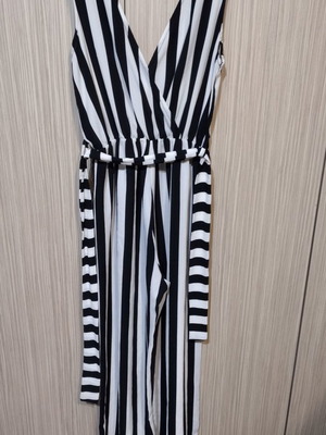 Striped polyester one-piece used, medium size with waist tie