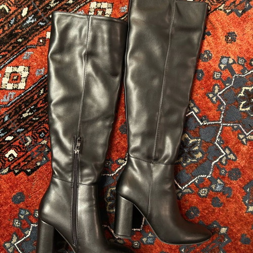 Black high boots made of smooth synthetic leather like new, size 38