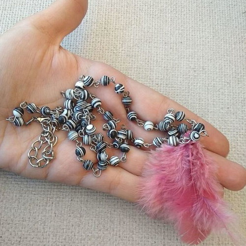 Long necklace with feather and semi-precious stones made to order