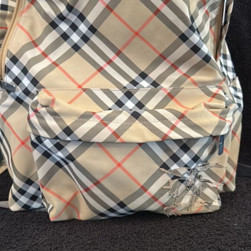 Burberry backpack like new with 2 zippered compartments and adjustable straps