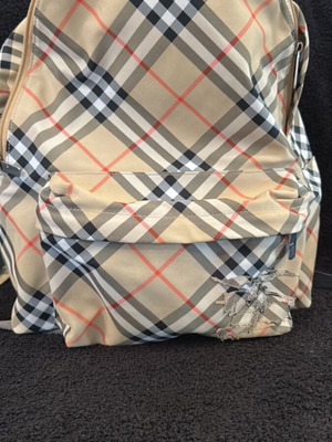 Burberry backpack like new with 2 zippered compartments and adjustable straps